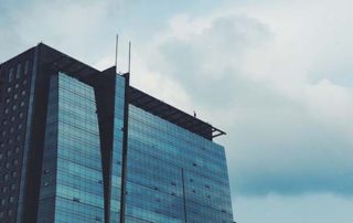 The top of a glass office building