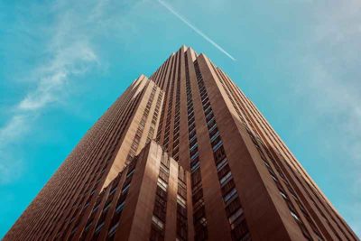 Upward looking perspective at a tall office building